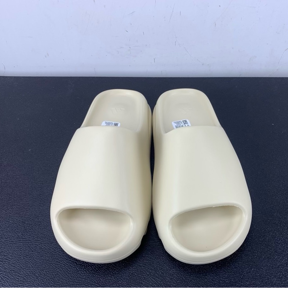 Brand new Yeezy slides never worn.